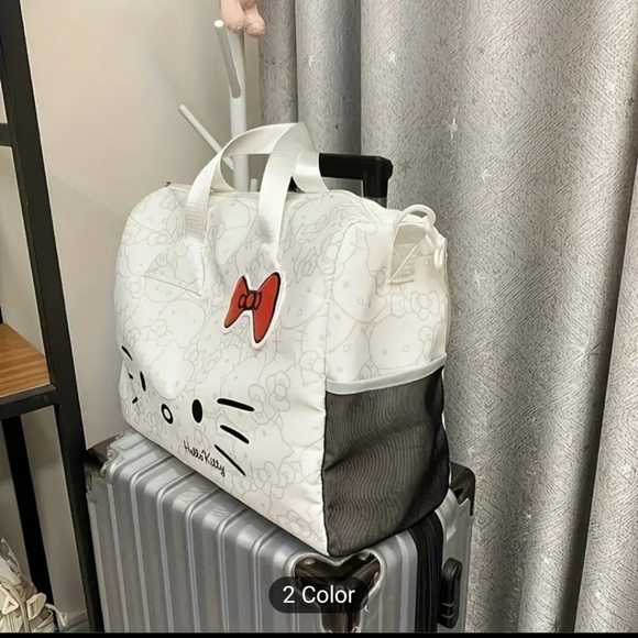 Sanrio Hello Kitty travel bag. Color: White with grey Hello Kitty designs throug - Picture 11 of 13